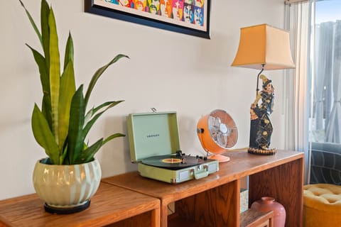 Set the mood with the vintage record player and enjoy the unique decor elements.