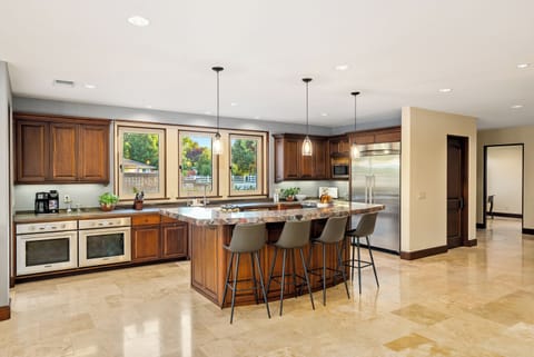 Spacious kitchen with bar seating