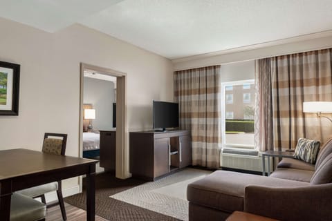 Suite, 1 King Bed, Accessible (Mobility & Hearing, Roll-in Shower) | Living area | 38-inch LCD TV with cable channels, TV