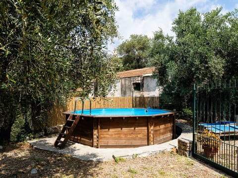 Blue, Swimming Pool, Composite Material, Shade, Backyard, Wood Stain, Resort, Water Feature, Eco Hotel