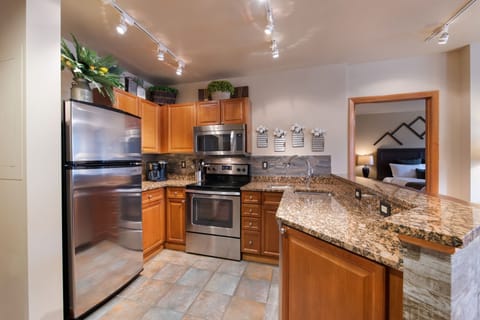 Condo, 2 Bedrooms | Private kitchen | Fridge, oven, coffee/tea maker, toaster