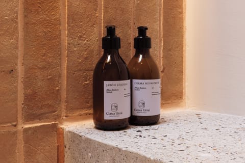 Deluxe Room, 1 King Bed | Bathroom | Hair dryer, bathrobes, towels, soap