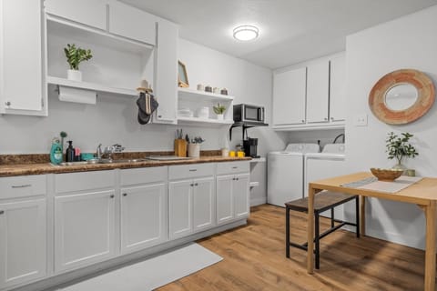 The kitchen is fully stocked with a Keurig coffee machine, toaster, microwave and oven. You have private access to a washer and dryer.