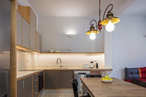 The large modern kitchen of the apartment that includes all the essentials.