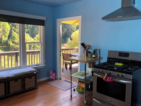 Step from the kitchen to the back deck to BBQ, dine al fresco, or just watch the river go by.