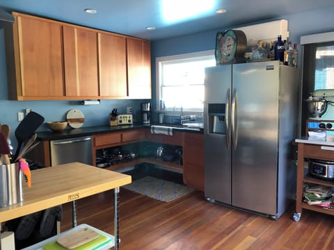 An updated kitchen with stainless steel appliances.