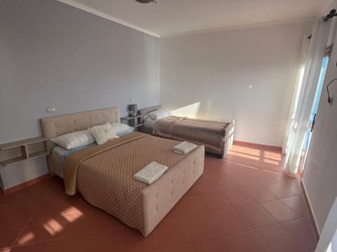 Classic Triple Room, Beach View | Desk, free WiFi
