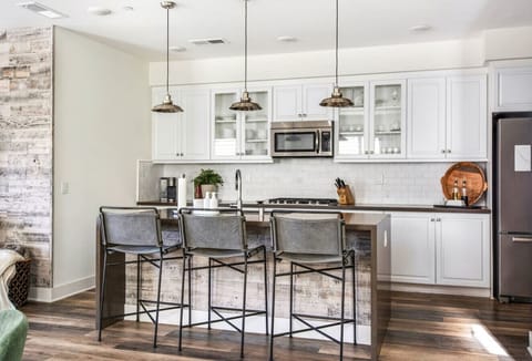 3 barstools at the kitchen counter