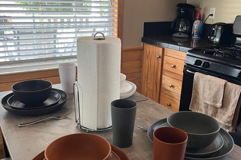 Kitchen with coffee and 6 sets of all kitchen ware 
