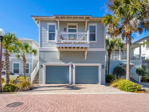 Simply The Beach - Charming studio carriage house with tropical landscaping and spacious garage in a peaceful beachside neighborhood.