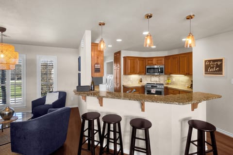 Open living, dining and kitchen area. Fully stocked kitchen.