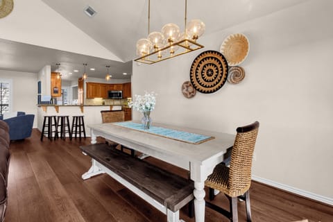 Open living, dining and kitchen area.