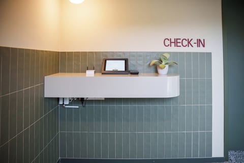 Check-in/check-out kiosk