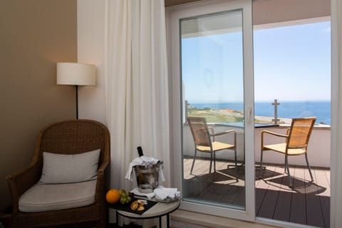 Superior Double or Twin Room, Sea View | Minibar, in-room safe, desk, blackout drapes