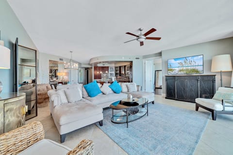 This thoughtfully designed living space maximizes natural light and integrates seamlessly with the surrounding environment. The open-concept layout and expansive windows create a bright and airy atmosphere.