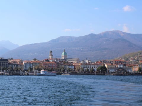 Mountainous Landforms, Water, Body Of Water, Mountain, Cloud, Hill, Waterway, Coastal And Oceanic Landforms, Mountain Range, Bank