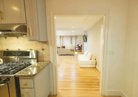 The doorway to the dining area and living room.