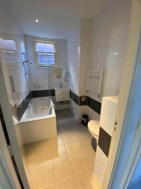 Basic Room, Canal View | Bathroom | Hair dryer, towels, soap, shampoo