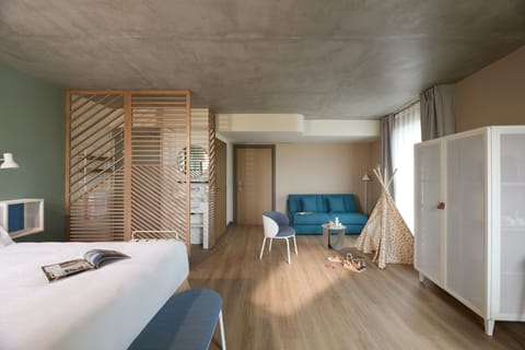 Premium Family Room including self-service snacks and drinks at the Club | In-room safe, desk, laptop workspace, blackout drapes