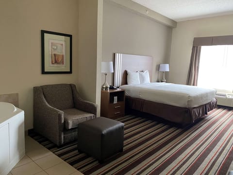 Suite, 1 King Bed, Non Smoking, Jetted Tub | In-room safe, desk, iron/ironing board, free cribs/infant beds