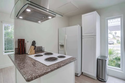 Kitchen with pantry and refrigerator
