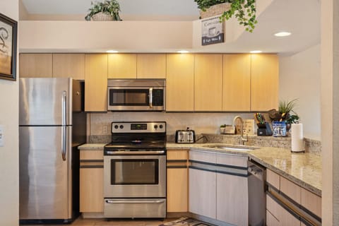The inviting kitchen offers ample storage & every home comfort