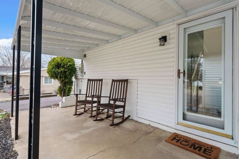 Sip morning coffee or an evening cocktail on the breezy front porch