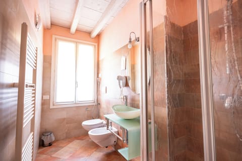 Shower, hair dryer, bathrobes, towels