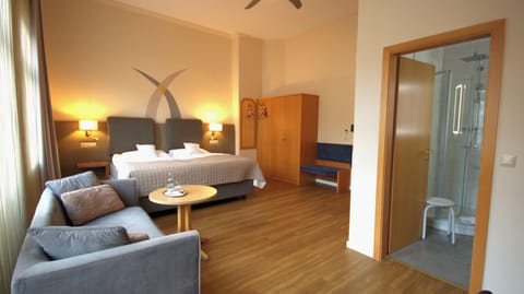 Luxury Double Room, 1 King Bed | Living area | 38-inch flat-screen TV with cable channels, printers