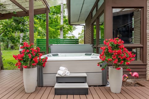 Soak, sip & stargaze—your private hot tub awaits.