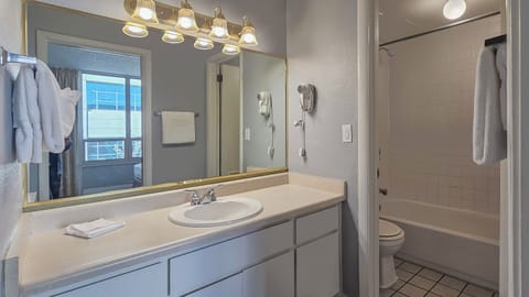 One-Bedroom Corner Suite | Bathroom | Bathtub, spring water tub, eco-friendly toiletries, hair dryer