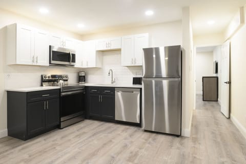 Suite, 1 Bedroom | Private kitchen | Fridge, microwave, oven, stovetop