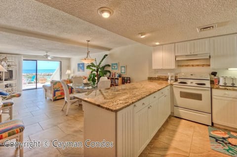 Condo, 3 Bedrooms, Oceanfront | Private kitchen | Full-size fridge, microwave, oven, stovetop