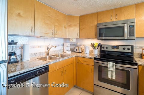 Condo, 3 Bedrooms, Oceanfront | Private kitchen | Full-size fridge, microwave, oven, stovetop