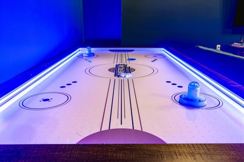 Air hockey just got an upgrade. Fast hands and bragging rights required.