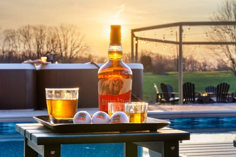 Unwind with a sunset soak and a sip—because therapy comes in many forms, and this one's our favorite.