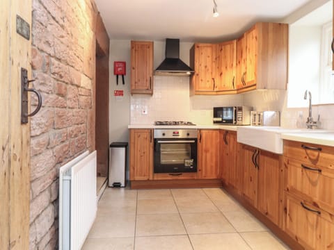 Fridge, electric kettle, toaster, cookware/dishes/utensils