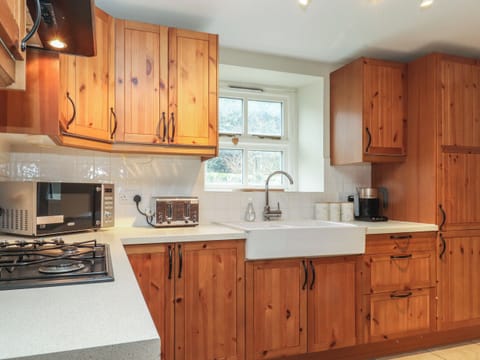 Fridge, electric kettle, toaster, cookware/dishes/utensils