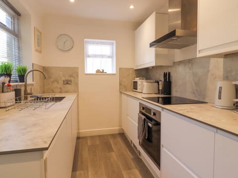 Fridge, electric kettle, cookware/dishes/utensils