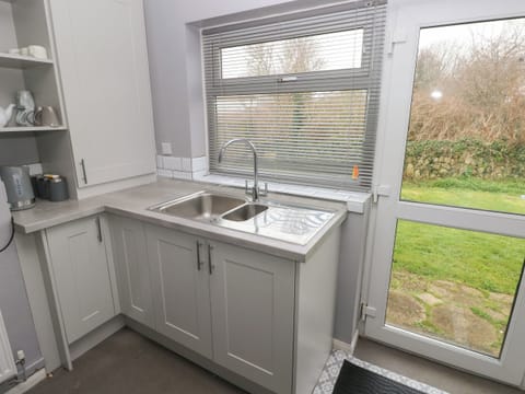 Fridge, electric kettle, toaster, cookware/dishes/utensils