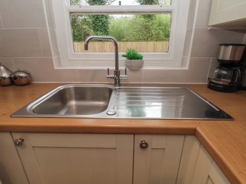 Fridge, electric kettle, toaster, cookware/dishes/utensils