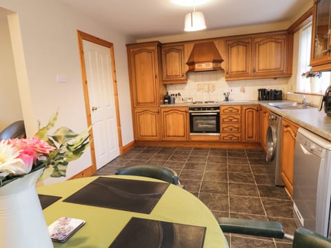 Fridge, electric kettle, toaster, cookware/dishes/utensils