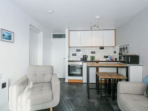 Fridge, electric kettle, toaster, cookware/dishes/utensils