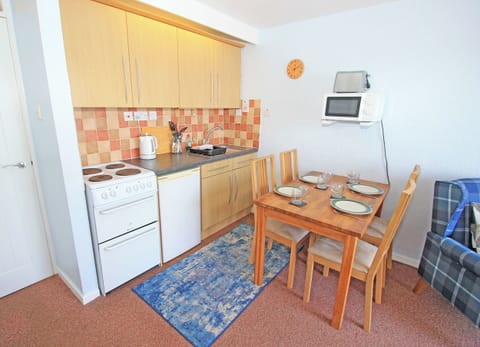 Fridge, electric kettle, toaster, cookware/dishes/utensils