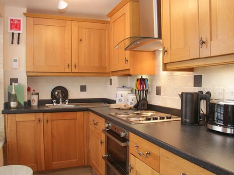 Fridge, electric kettle, toaster, cookware/dishes/utensils