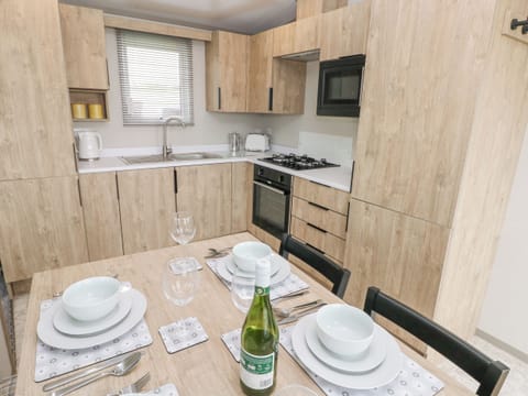 Fridge, electric kettle, toaster, cookware/dishes/utensils