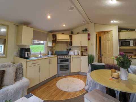 Fridge, electric kettle, toaster, cookware/dishes/utensils