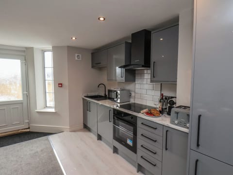 Fridge, electric kettle, toaster, cookware/dishes/utensils