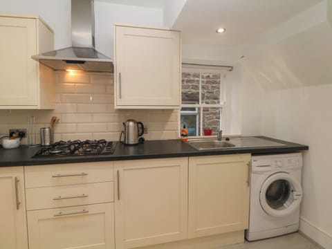 Fridge, electric kettle, toaster, cookware/dishes/utensils