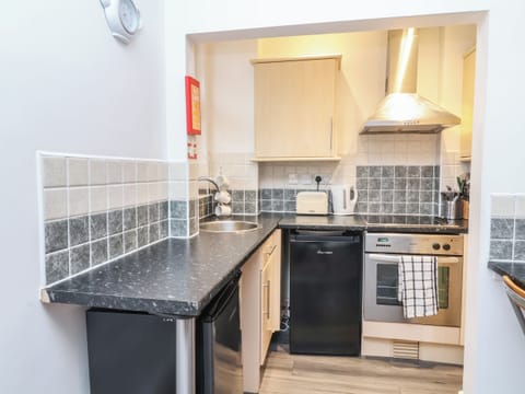 Fridge, electric kettle, toaster, cookware/dishes/utensils